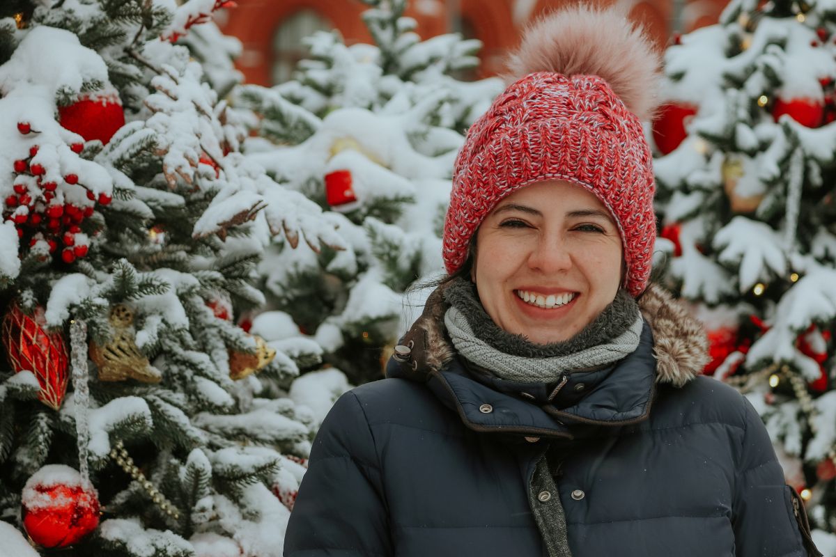 snowy christmas scene Snowy Christmas scene with a cheerful person smiling.
